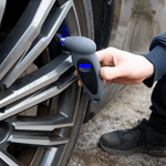 Digital tire pressure gauge with LED display showing 0-100 PSI for cars, motorcycles, and bicycles
