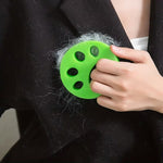 Reusable pet hair remover with paw print design for laundry washing machine use